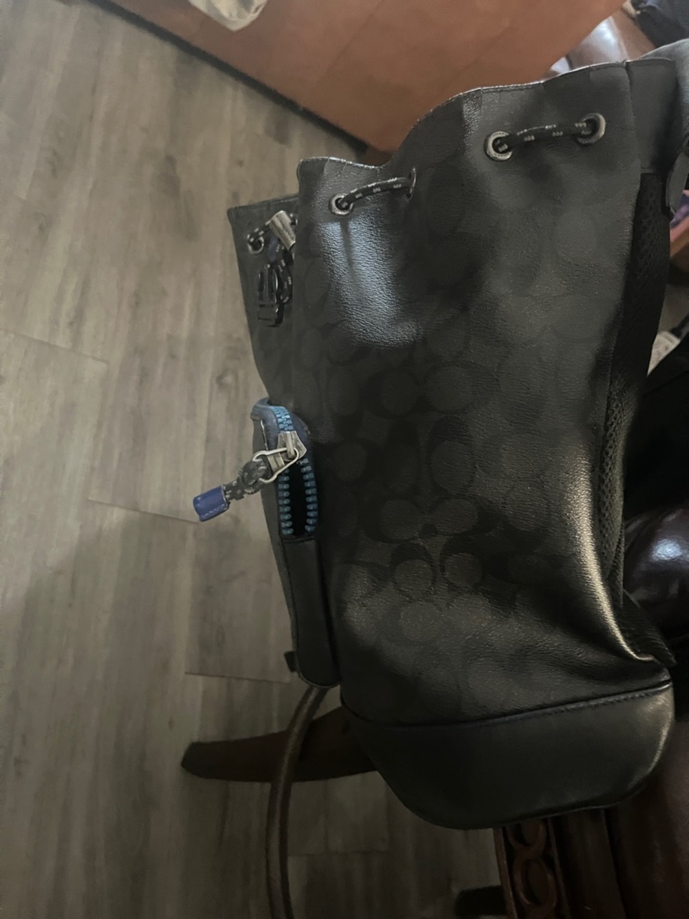 Coach Black Signature Drawstring Tote with Blue Zip Accent